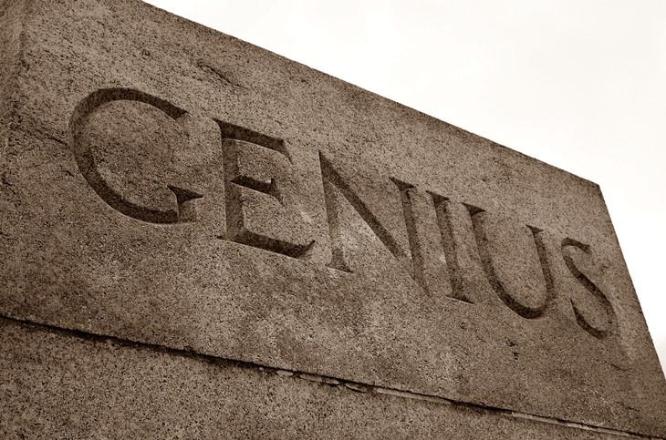 Genius carved in plinth